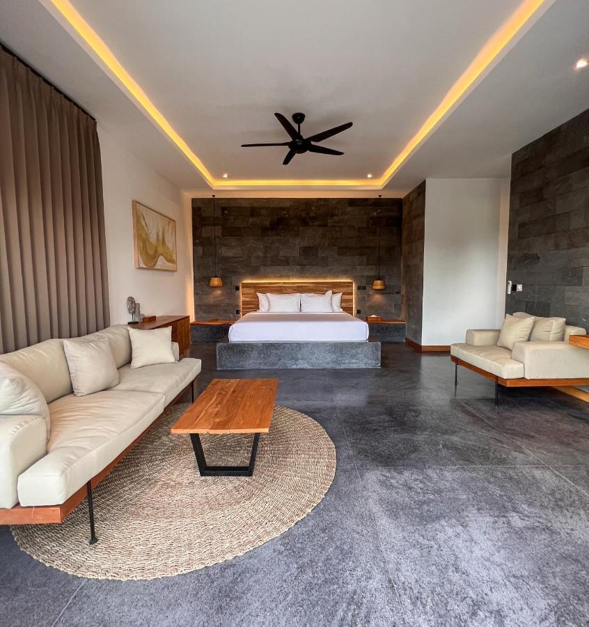 Hotel Neano Escape Manggis Exterior foto A bedroom at the resort