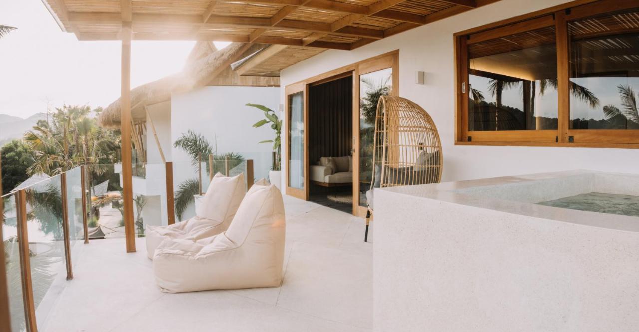 Hotel Neano Escape Manggis Exterior foto The interior of a villa at the resort