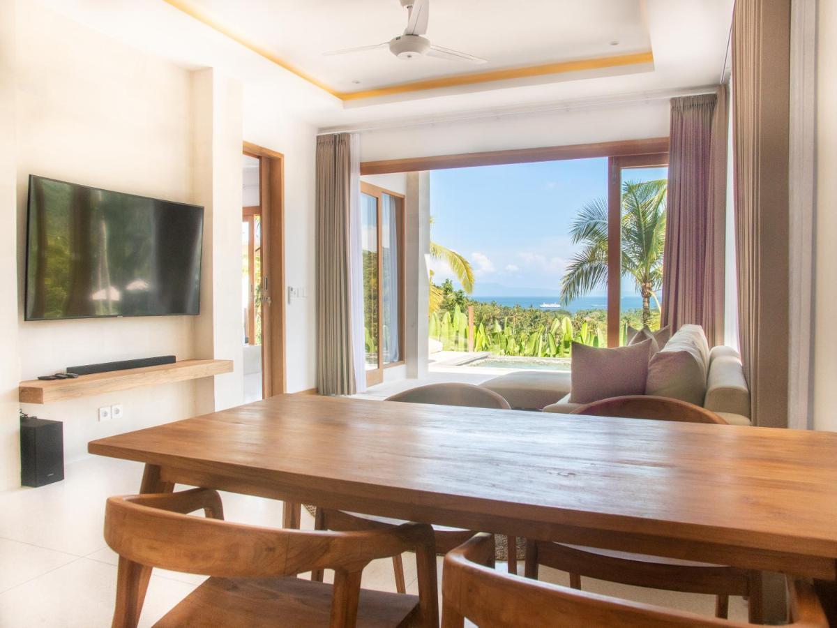 Hotel Neano Escape Manggis Exterior foto Living room at the Beachfront Pool Villa